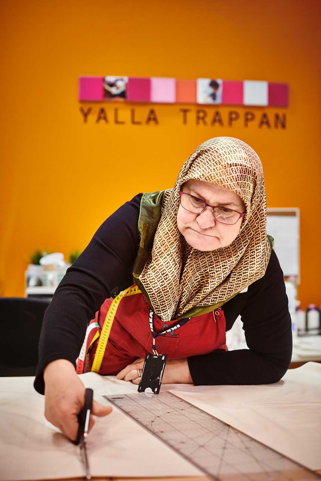 Woman cutting fabric